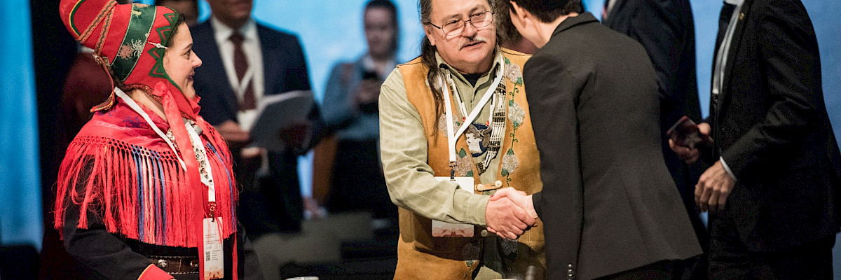 Arctic Council Ministerial meeting in Rovaniemi, Finland, 2019. Then Foreign Minister of Norway, Ine Marie Eriksen Søreide, greets Chief Gary Harrison from the Arctic Athabaskan Council