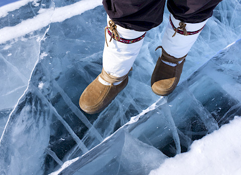 Traditional boots on ice